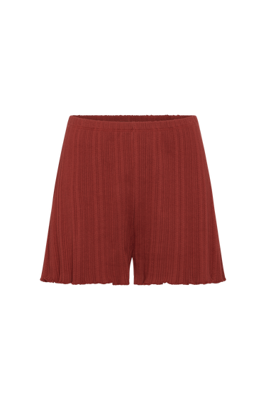 Red pleated skirt on a white background