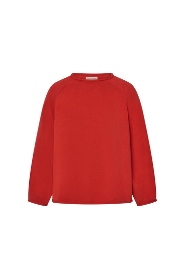 Red knit sweater with rolled hems on a white background.