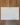 Calendar sheet titled 'Our Month' on a wooden surface