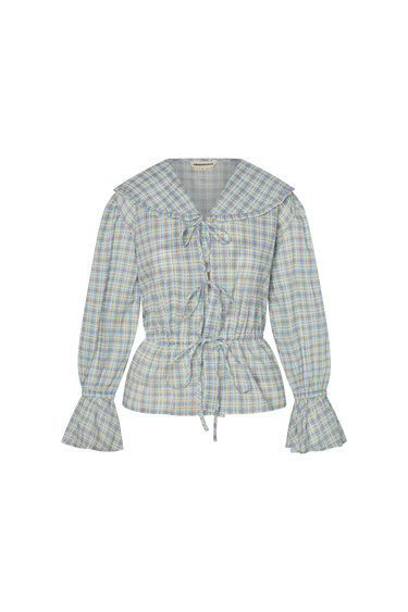 Blue plaid blouse with front ties on a white background