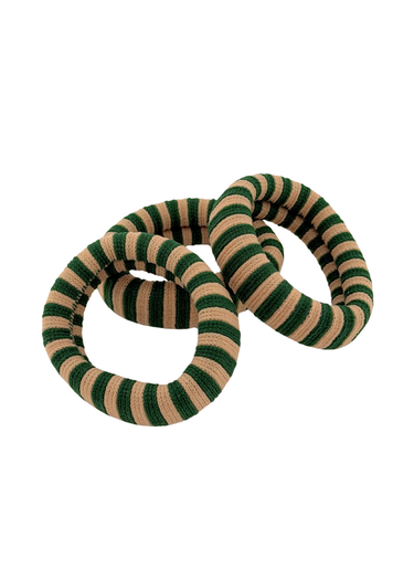Striped green and beige rubber band on a white background