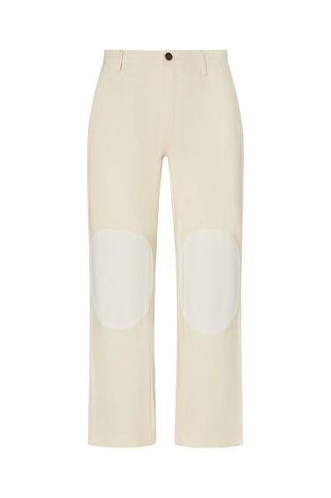 Cream pants with a white knee patches on a white background.