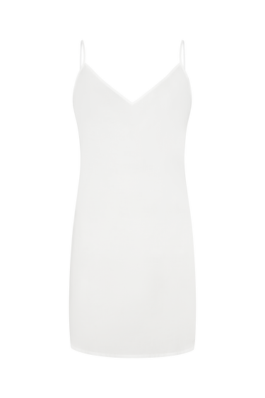 White, spaghetti strap slip dress on a white background