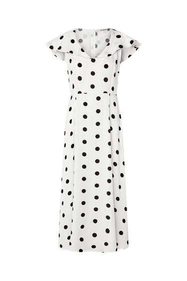 White dress with black polka dots on a white background