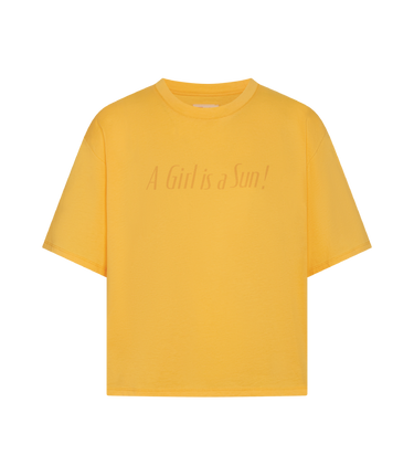 A yellow short-sleeve crewneck t-shirt with the phrase 'A Girl is a Sun!' printed in a subtle, tonal cursive font across the chest, displayed on a solid white background.