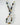 Necklace with multicolored beads on a white background