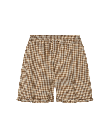Brown plaid boxer-style shorts with a ruffle detail at the bottom on a white background.