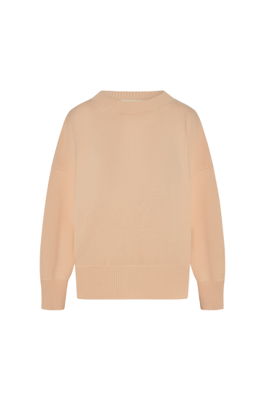 Blush pink sweater on a white background.
