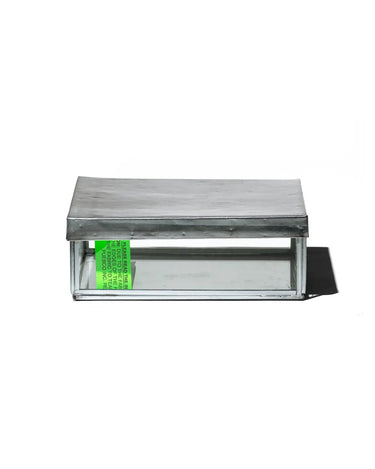 Metallic box with a green label on a white background