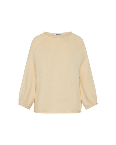 Butter yellow sweater on a white background