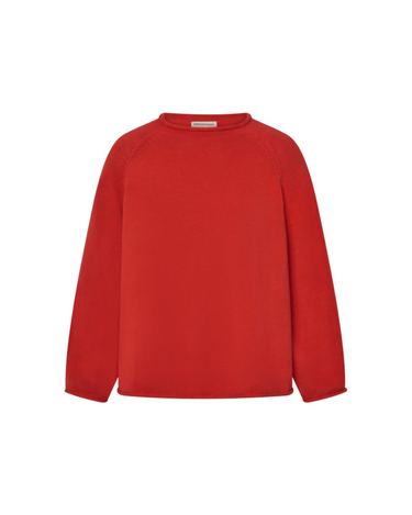 Red knit sweater with rolled hems on a white background.