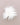 A fluffy white feather pom-pom accessory photographed from above on a plain warm taupe background.
