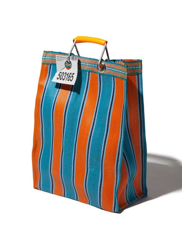 Striped orange and blue bag with a tag on a white background