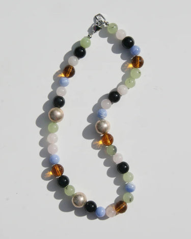 Multicolored beaded necklace on a white background