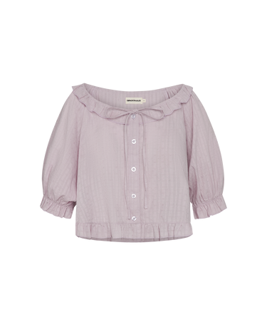 Light purple blouse with a bow neckline on a white background