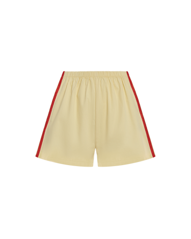 Beige athletic shorts with red side stripes, displayed flat against a solid white background.