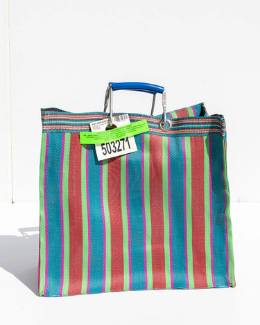 Square multicolor striped tote bag with a blue handle.