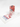 Red package on a white surface with a visible brand logo