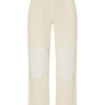 Cream pants with a white knee patches on a white background.