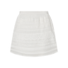 White skirt with eyelet detailing on a white background