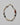 Multicolored beaded necklace on a white background
