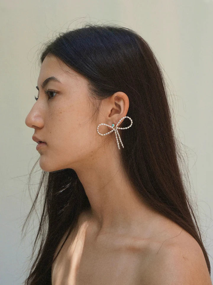 Boucles d'oreilles nœud en cristal et perles