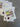 Color swatch cards on a concrete surface