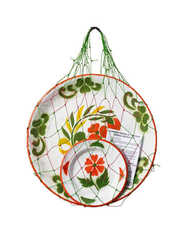 Floral-patterned plates in a mesh bag on a white background