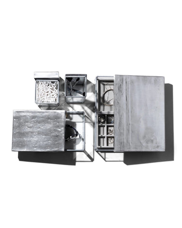 Silver jewelry organizer with compartments on a white background