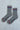 Gray socks with red and blue accents and 'LEBON SHOPPE' branding on a light gray background