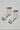 Pair of socks with red, white, and blue stripes on a light gray background
