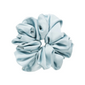 Light blue scrunchie on a white background