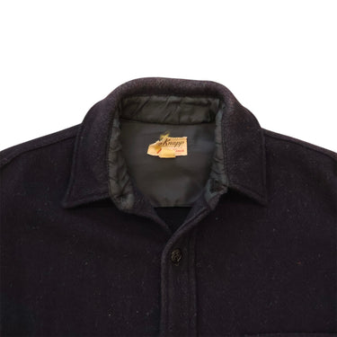 Dark coat collar with brand label on a white background
