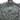Green denim shirt with button details on a light gray background