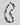 Multicolored beaded necklace on a white background