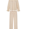 Cream and red floral print long sleeve blouse with a ruffled collar and matching pants with a ruffled hem on a white background.