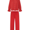 Red long sleeve blouse with a ruffled collar and matching pants with a ruffled hem on a white background.