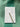 Notepad with a daily schedule and pen on a green fabric background